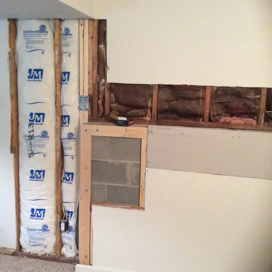Wall insulation replacement during Basement Flood Cleanup in Freetown